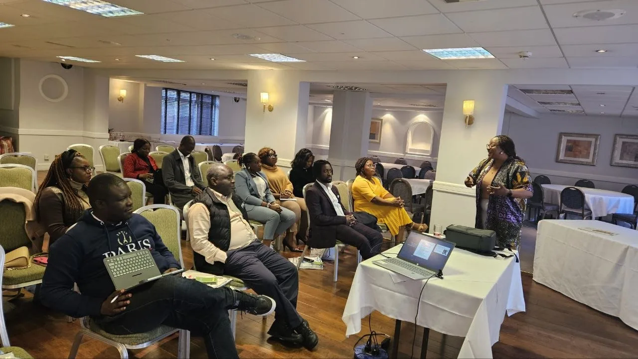 Attendees seated in a panel discussion