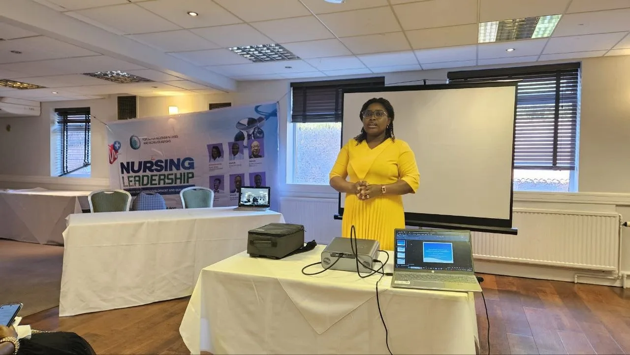 A speaker addressing attendees
